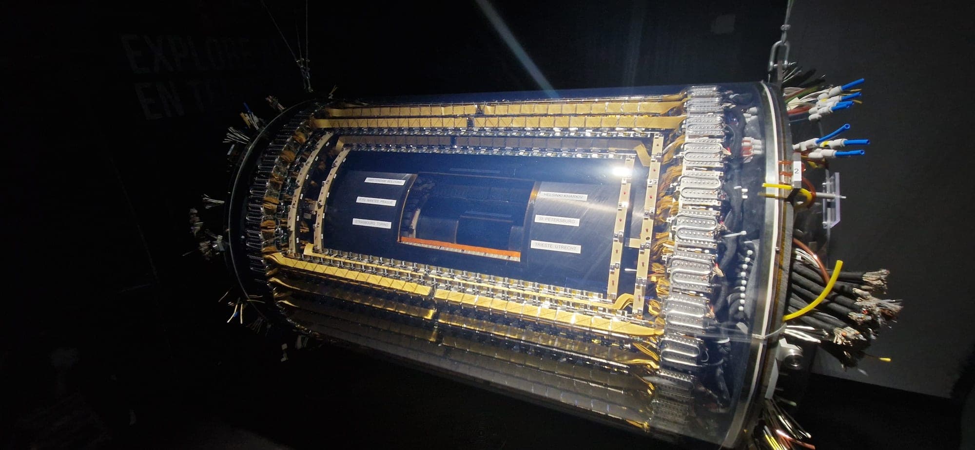 A cylindrical particle detector on display at CERN